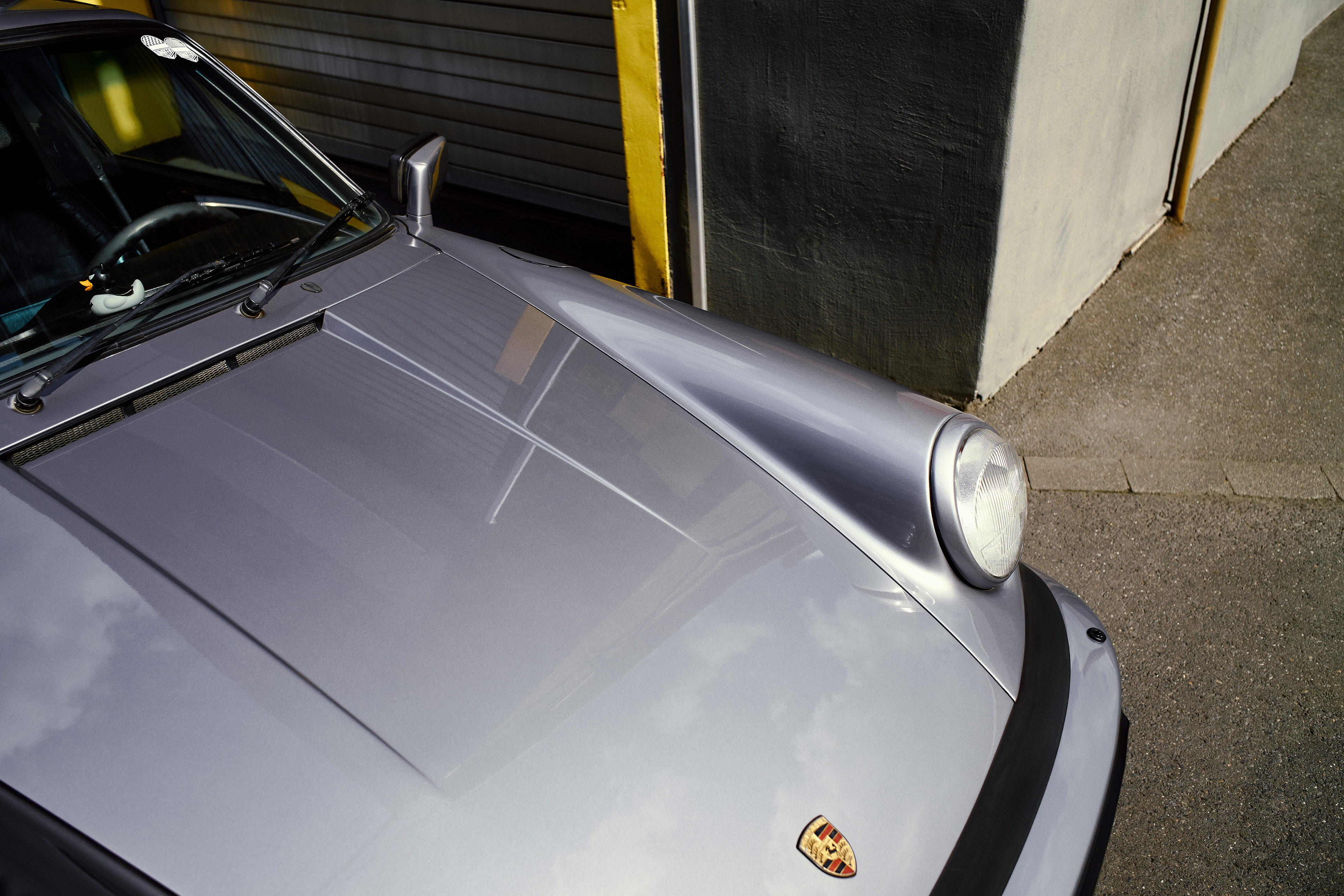 Porsche Header