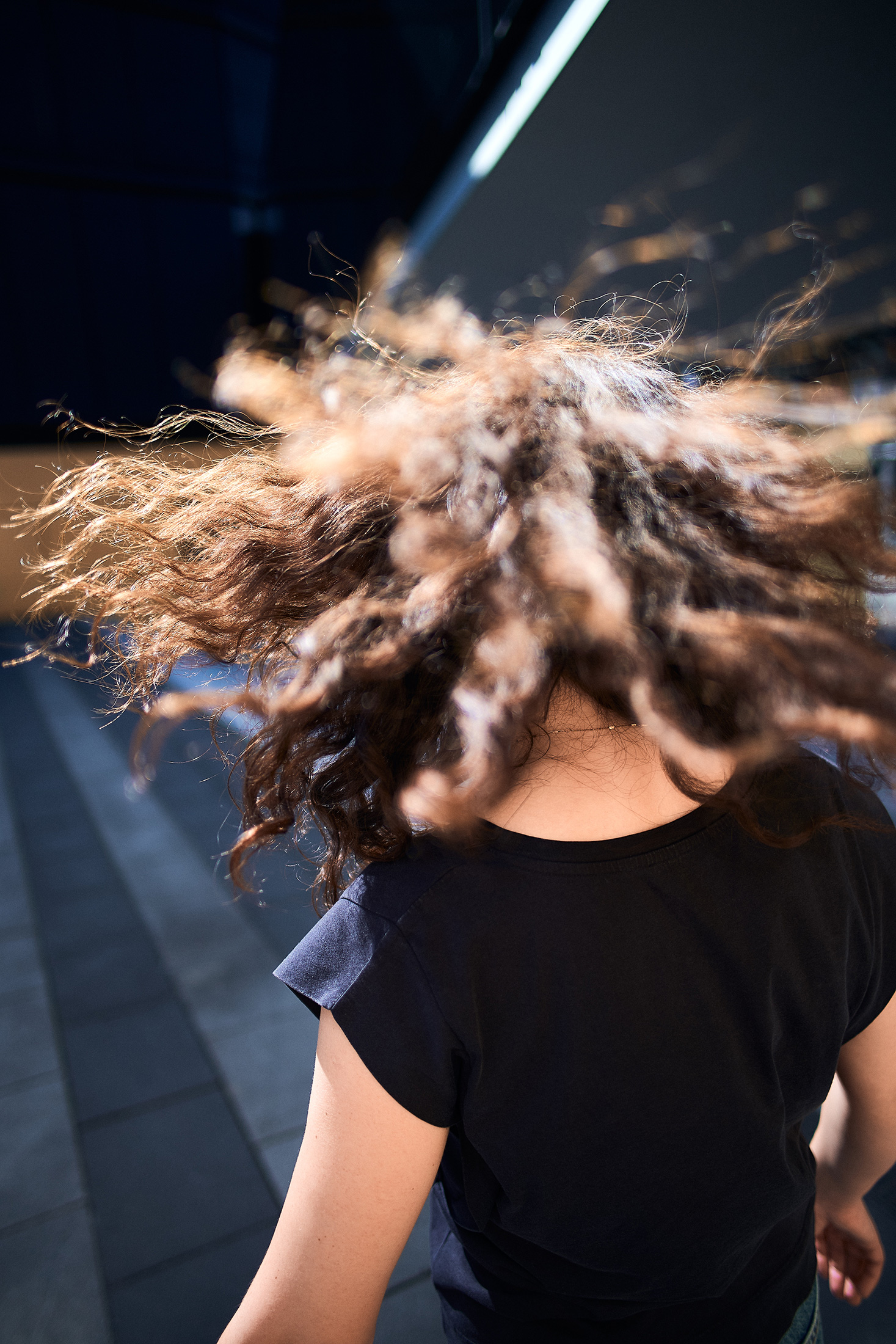 Portrait von Tine. Fliegende Haare.